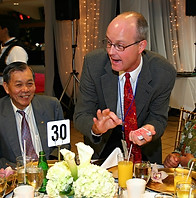 David Peck performing table-side at a gala dinner